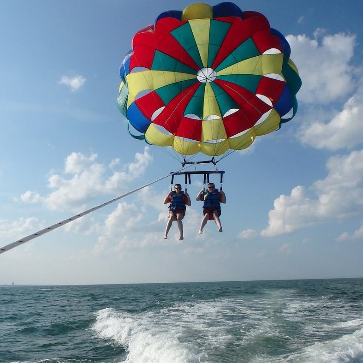 a parachute with a body of water